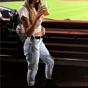 Light wash denim distressed knee mom jeans